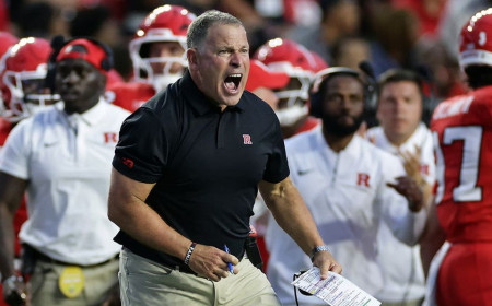 Rutgers' Greg Schiano crashes out on official after costly penalty in tough loss to USC